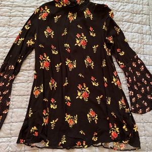 Free People peephole back tunic in black